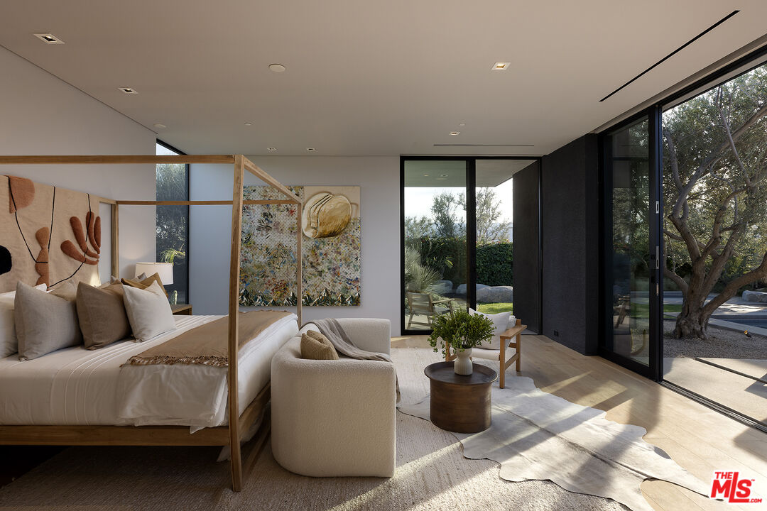 2 Echo Lane Rancho Mirage, CA 92270 - Photo 15 of 37 a living room with furniture and a large window
