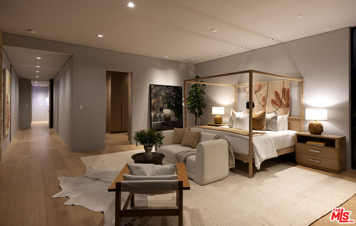 2 Echo Lane Rancho Mirage, CA 92270 - Photo 16 of 37 a living room with furniture and a chandelier