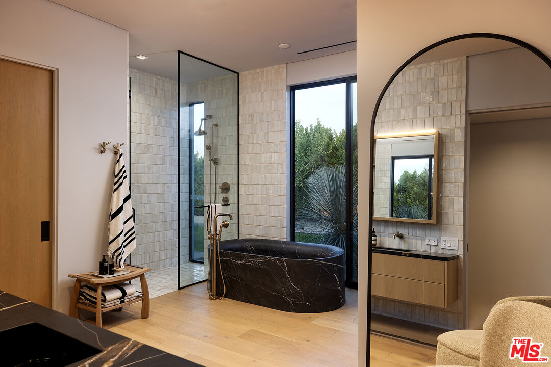 2 Echo Lane Rancho Mirage, CA 92270 - Photo 17 of 37 a living room with a large window and furniture