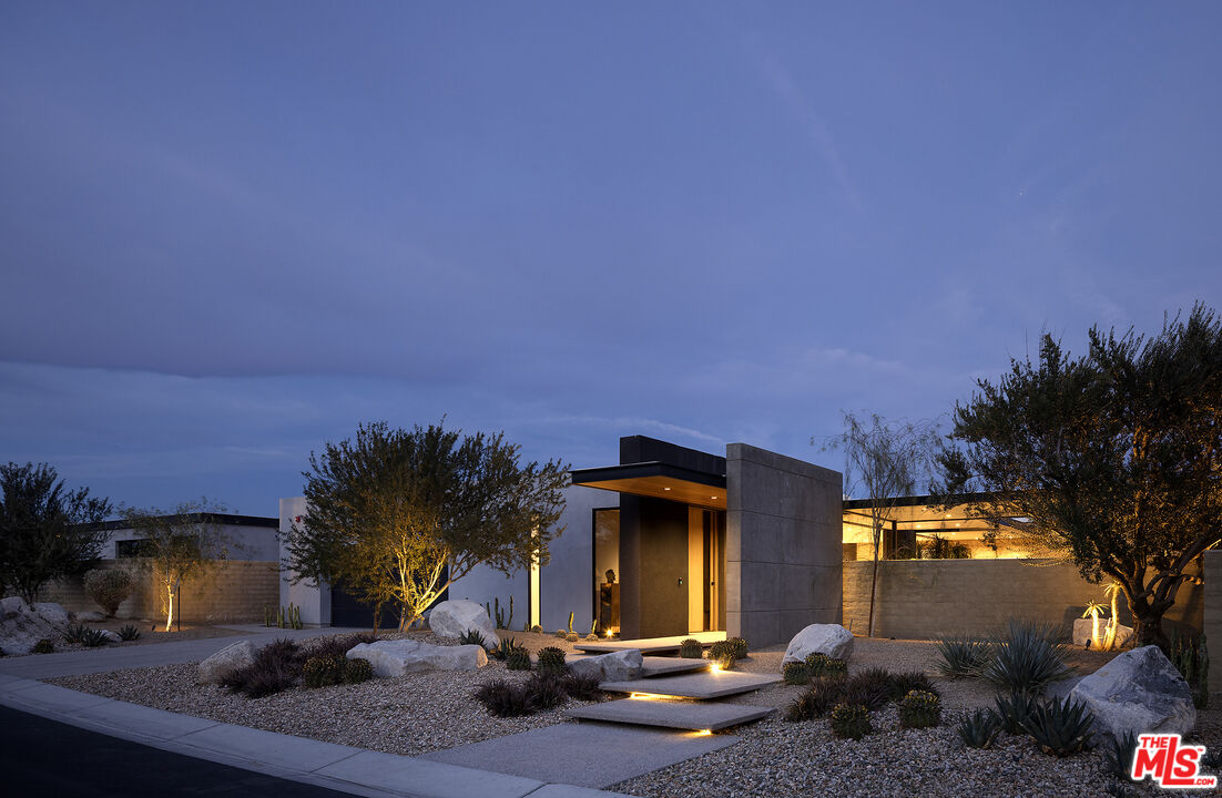 2 Echo Lane Rancho Mirage, CA 92270 - Photo 2 of 37 a front view of a house with a yard
