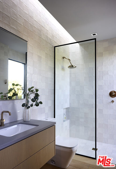 2 Echo Lane Rancho Mirage, CA 92270 - Photo 21 of 37 a bathroom with a sink and a mirror