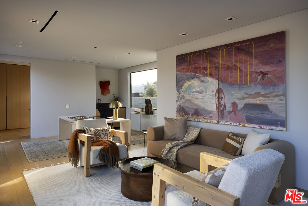 2 Echo Lane Rancho Mirage, CA 92270 - Photo 28 of 37 a living room with furniture and a painting