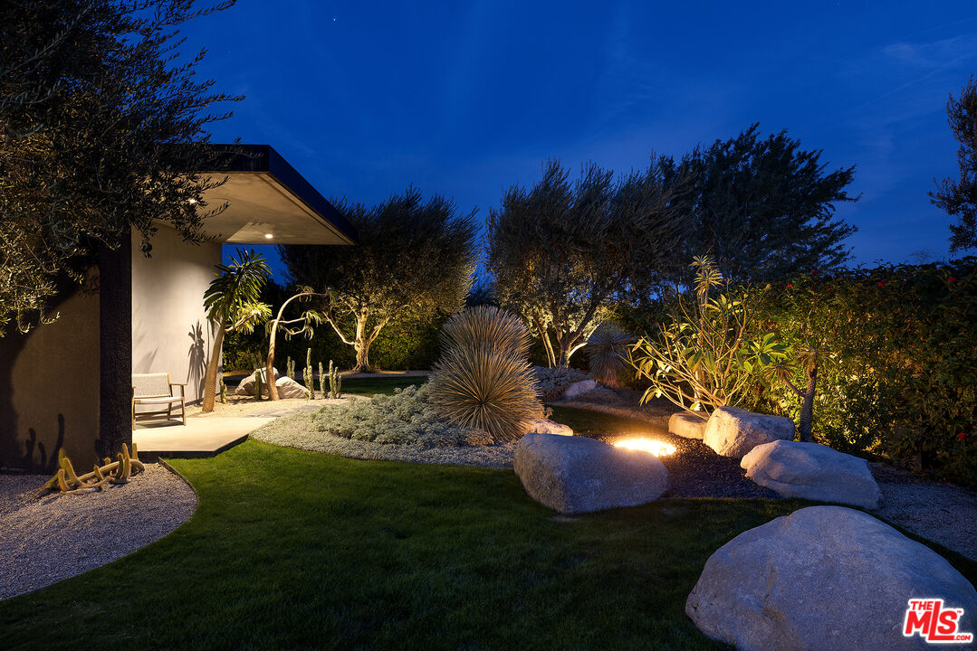 2 Echo Lane Rancho Mirage, CA 92270 - Photo 36 of 37 a view of a backyard with plants and a fountain