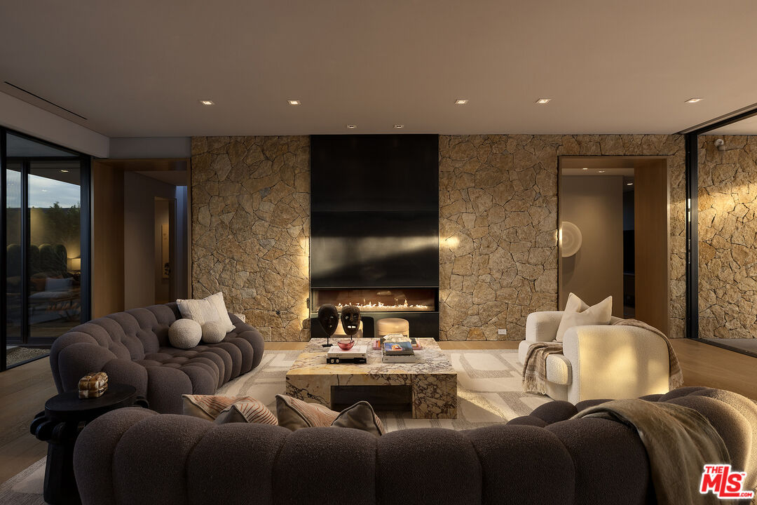 2 Echo Lane Rancho Mirage, CA 92270 - Photo 10 of 37 a living room with furniture and a flat screen tv