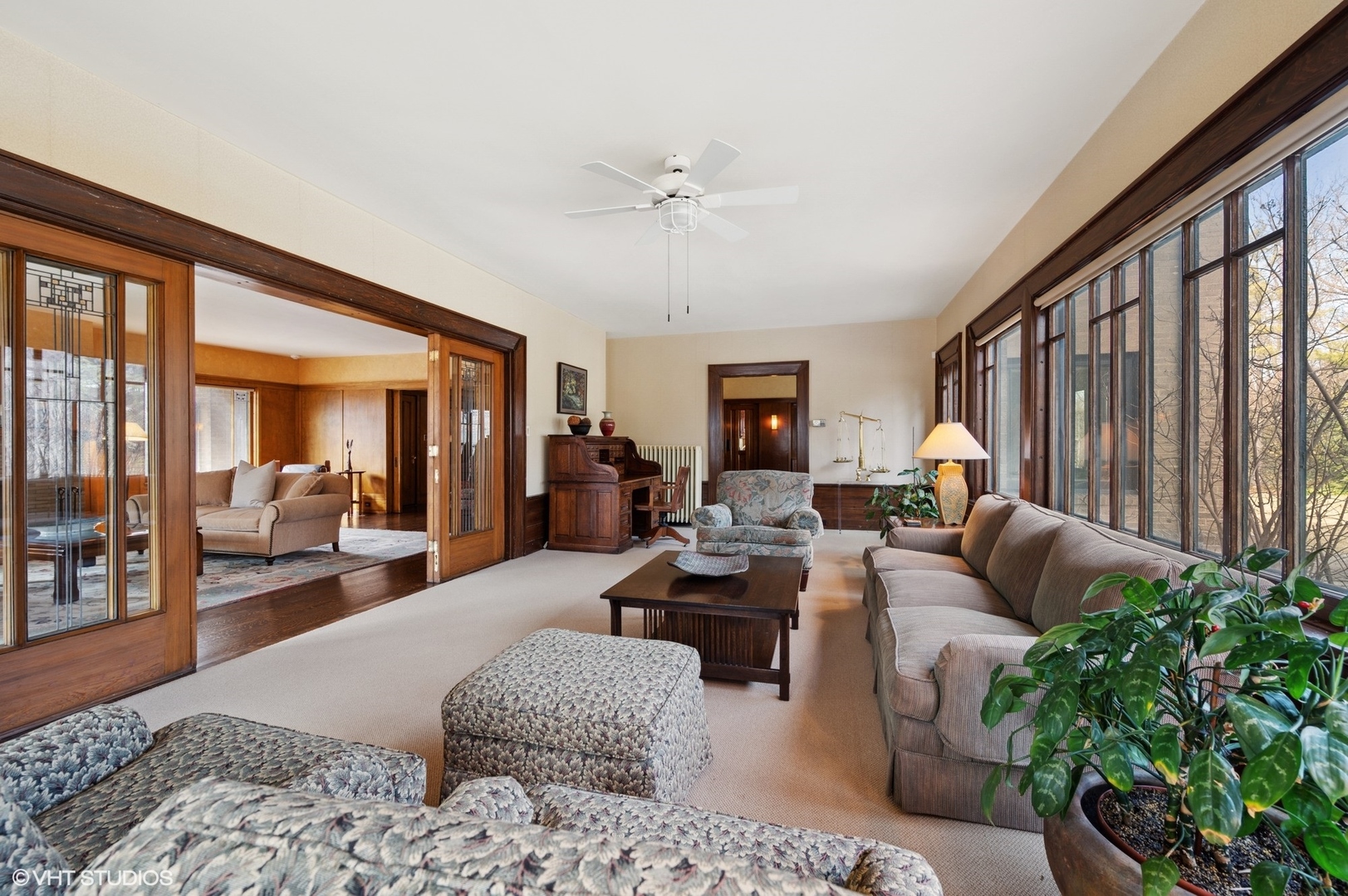 881 Private Road Winnetka, IL 60093 - Photo 12 of 60 a living room with patio furniture and a potted plant