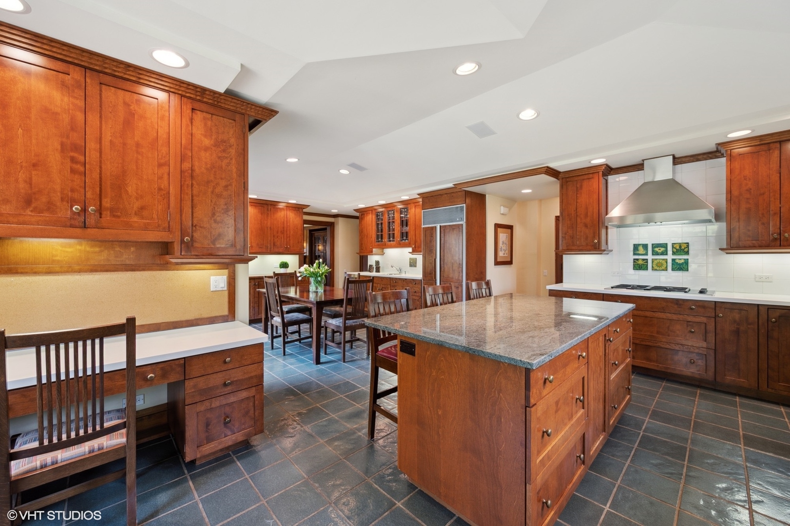 881 Private Road Winnetka, IL 60093 - Photo 18 of 60 a kitchen with stainless steel appliances granite countertop a stove a sink and a refrigerator