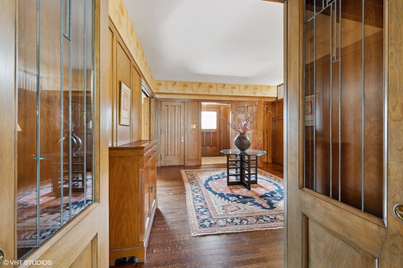 881 Private Road Winnetka, IL 60093 - Photo 2 of 60 a living room with fireplace furniture and a floor to ceiling window