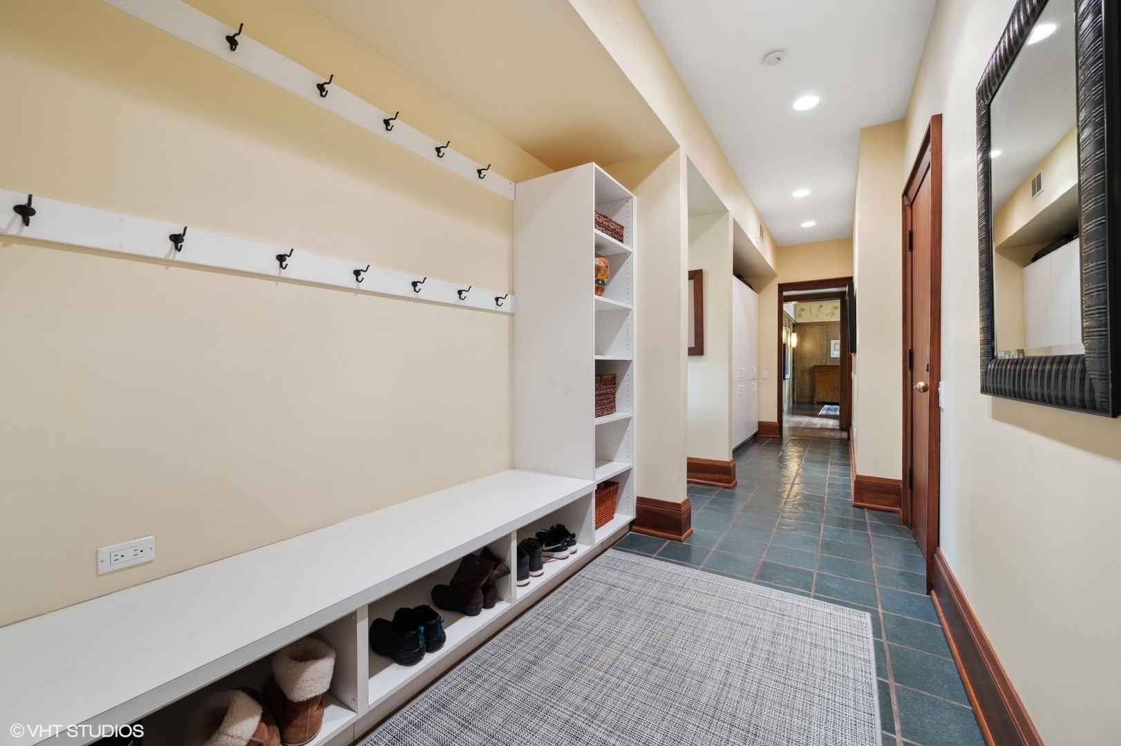 881 Private Road Winnetka, IL 60093 - Photo 23 of 60 a hallway with wooden floor and staircase