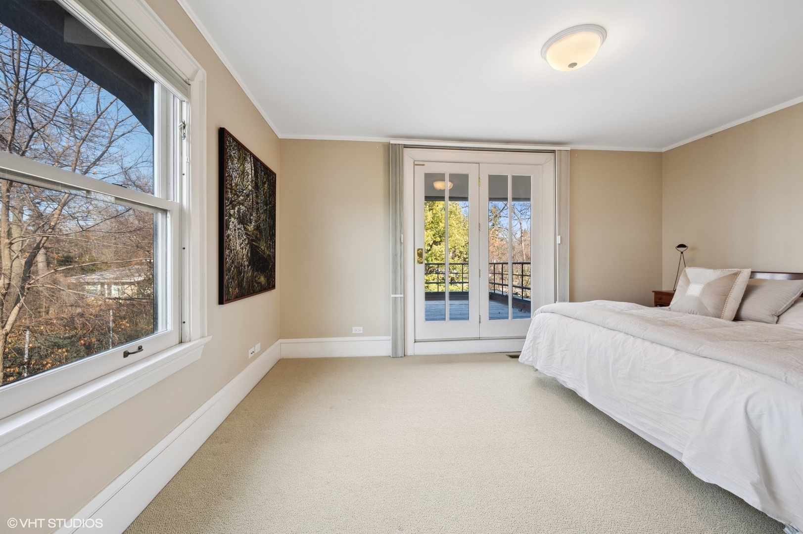 881 Private Road Winnetka, IL 60093 - Photo 39 of 60 a spacious bedroom with a large bed and a large window