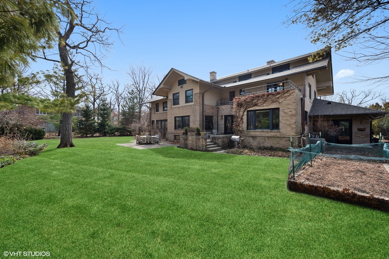 881 Private Road Winnetka, IL 60093 - Photo 50 of 60 a front view of house with yard and outdoor seating