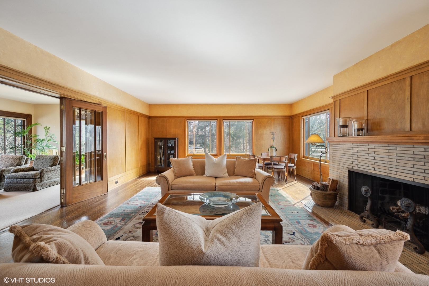 881 Private Road Winnetka, IL 60093 - Photo 5 of 60 a living room with furniture and a fireplace