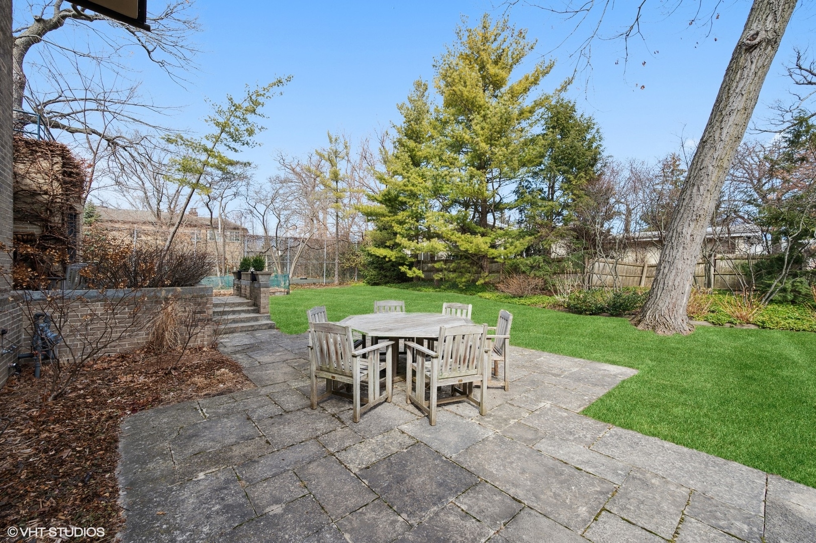 881 Private Road Winnetka, IL 60093 - Photo 51 of 60 a view of a dining room with a table and chairs
