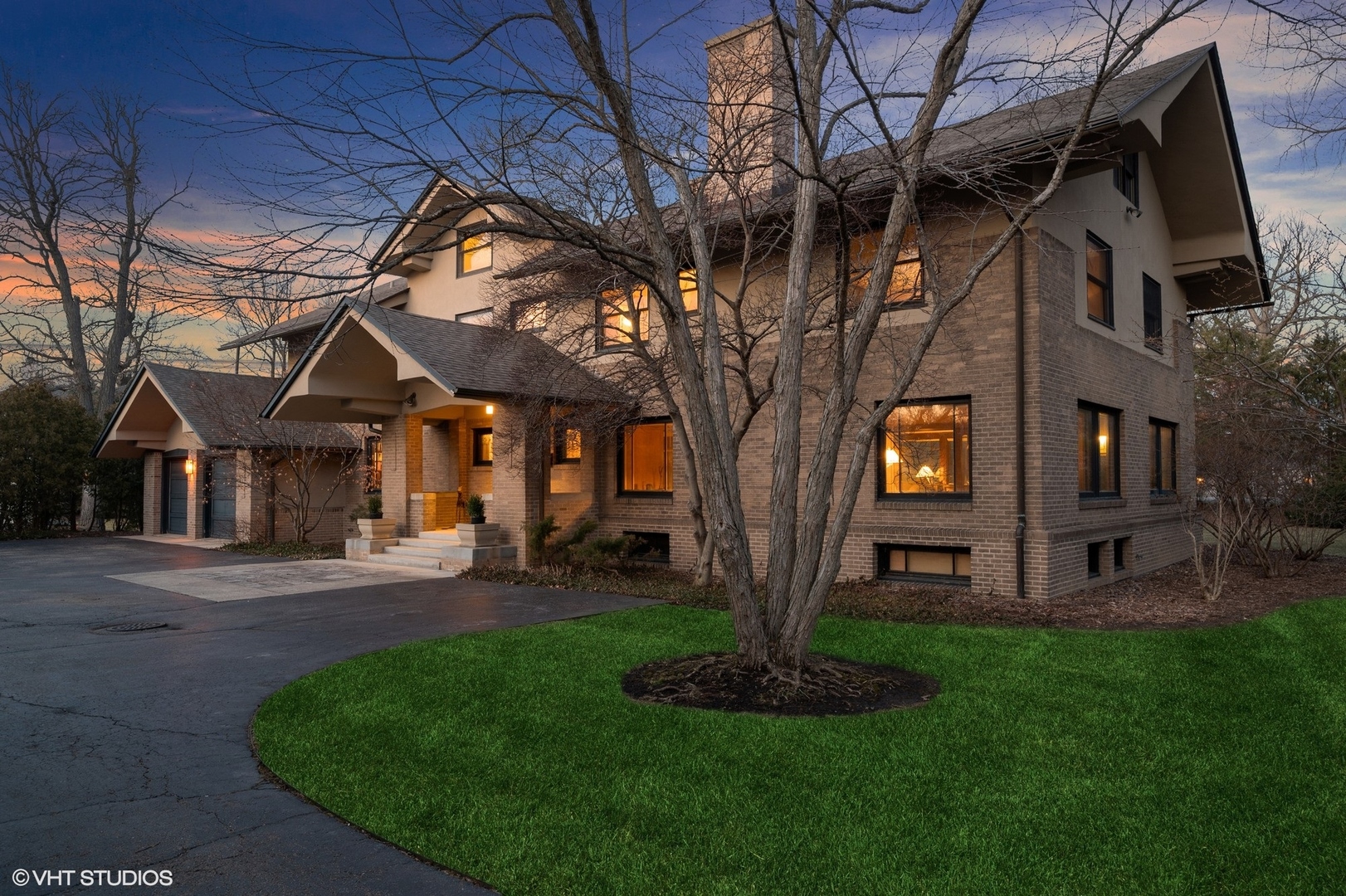 881 Private Road Winnetka, IL 60093 - Photo 55 of 60 a front view of a house with a garden and trees