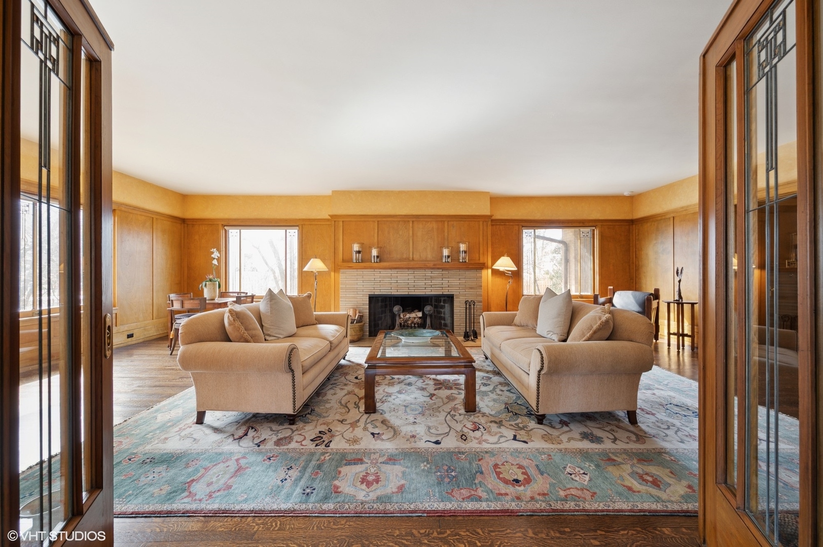 881 Private Road Winnetka, IL 60093 - Photo 9 of 60 a living room with furniture a large window and a fireplace