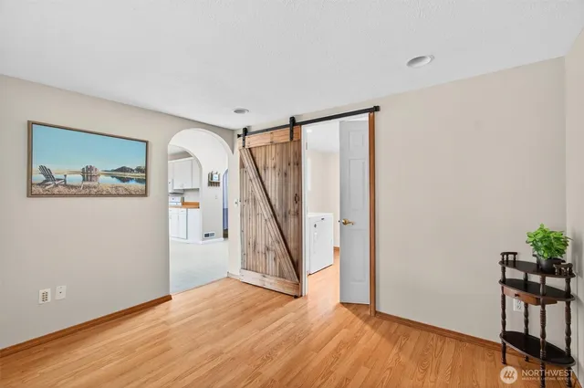 a view of storage and utility room with washer and dryer