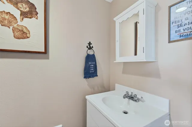 a view of a bedroom with furniture and windows
