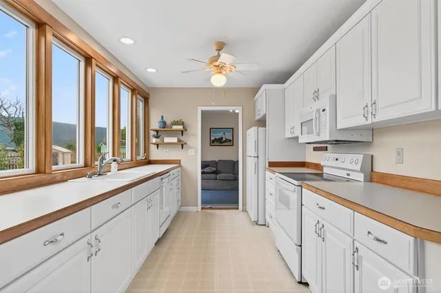a large kitchen with cabinets