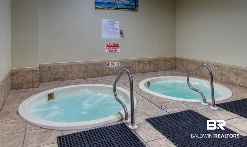 375 Plantation Road, Unit 5814 Gulf Shores, AL 36542 - Photo 16 of 31 View of swimming pool with a hot tub