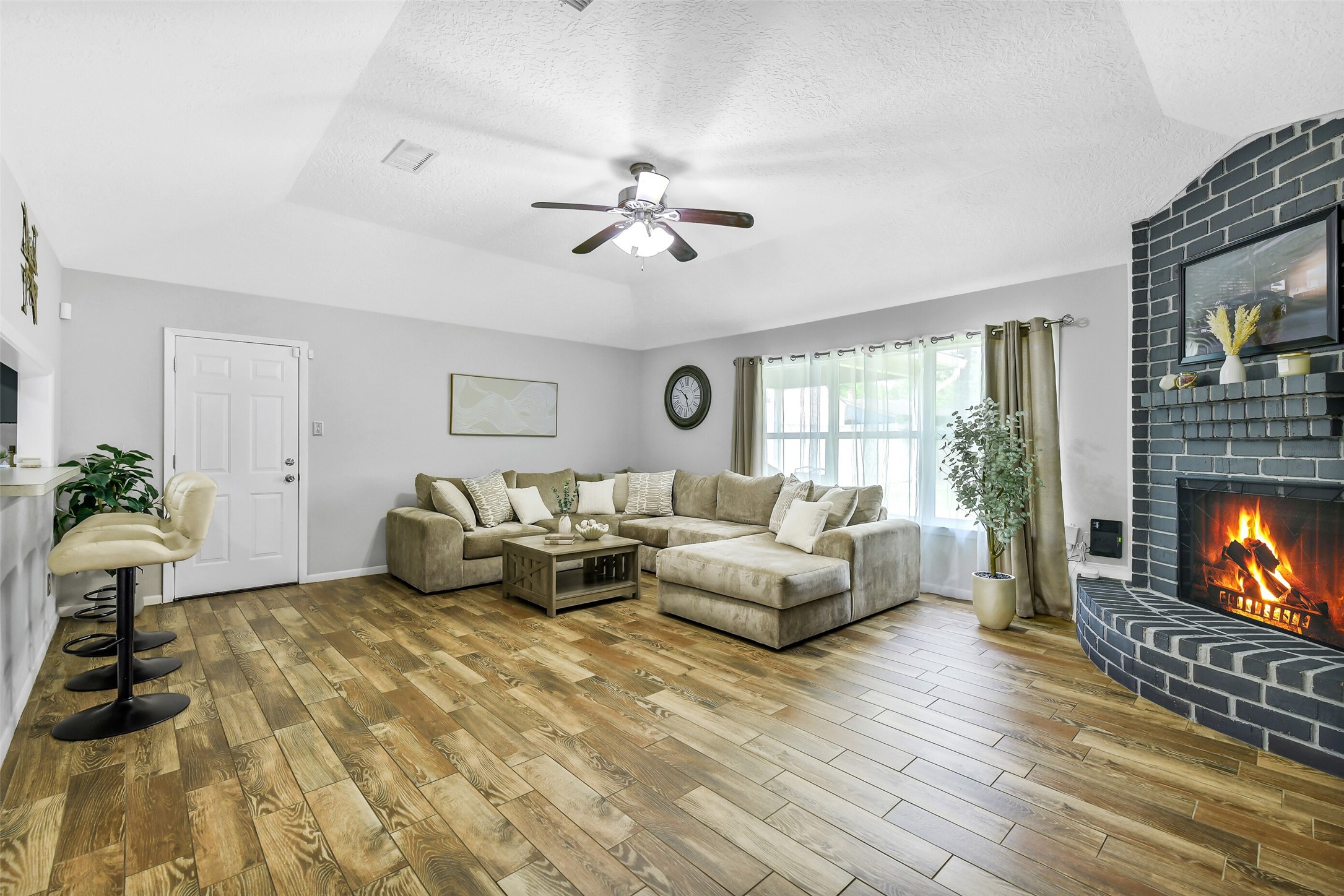 710 Razee Court Crosby, TX 77532 - Photo 8 of 31 a living room with fireplace furniture and a fireplace