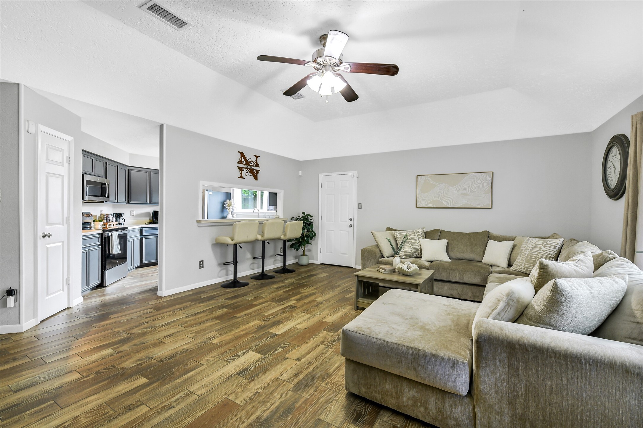 710 Razee Court Crosby, TX 77532 - Photo 9 of 31 a living room with furniture and kitchen view