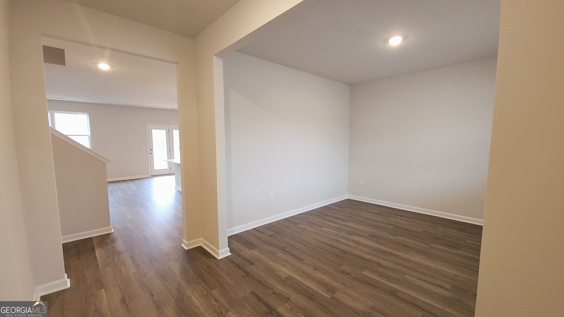 501 Vervain Drive, Unit 174 Locust Grove, GA 30248 - Photo 12 of 33 a view of a hallway with wooden floor