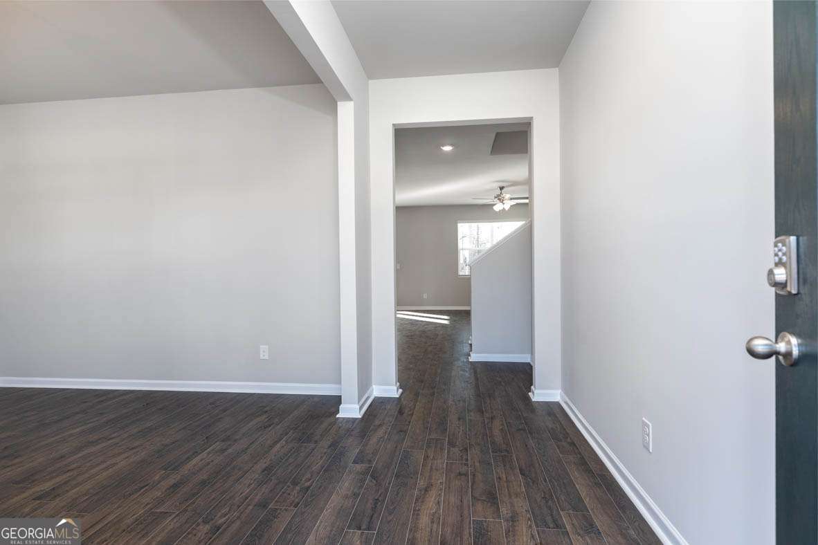 501 Vervain Drive, Unit 174 Locust Grove, GA 30248 - Photo 29 of 33 a view of a room with wooden floor