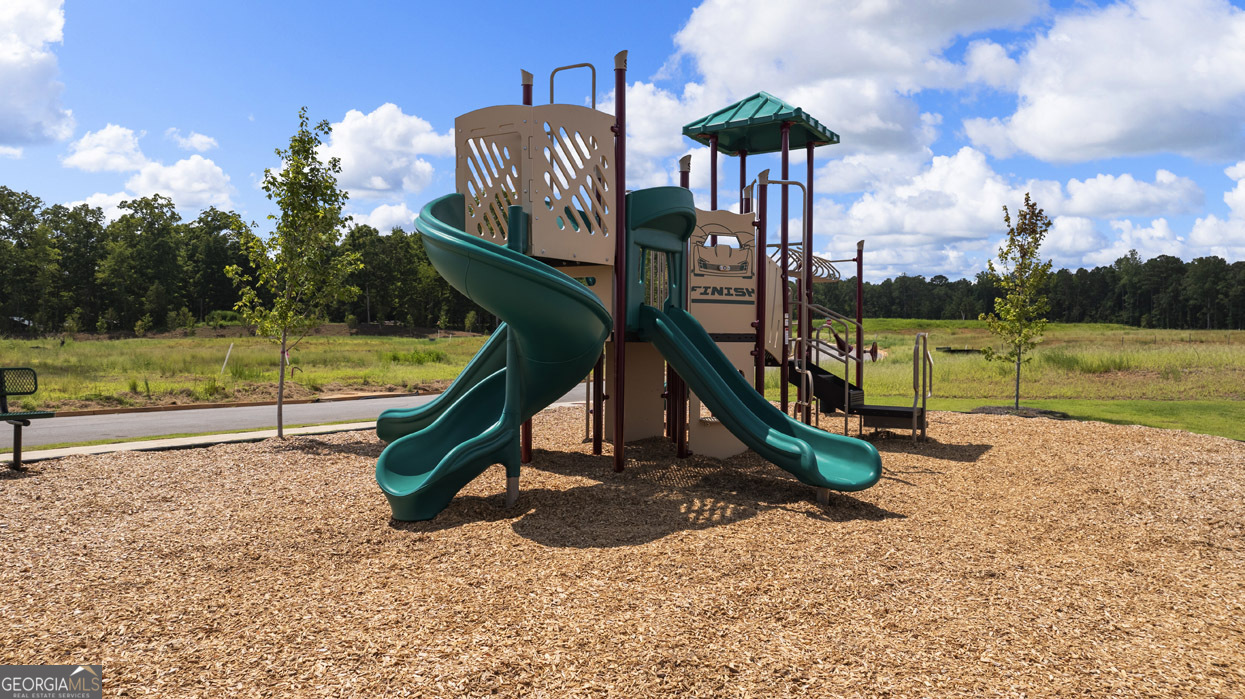 501 Vervain Drive, Unit 174 Locust Grove, GA 30248 - Photo 5 of 33 a park with kid zone