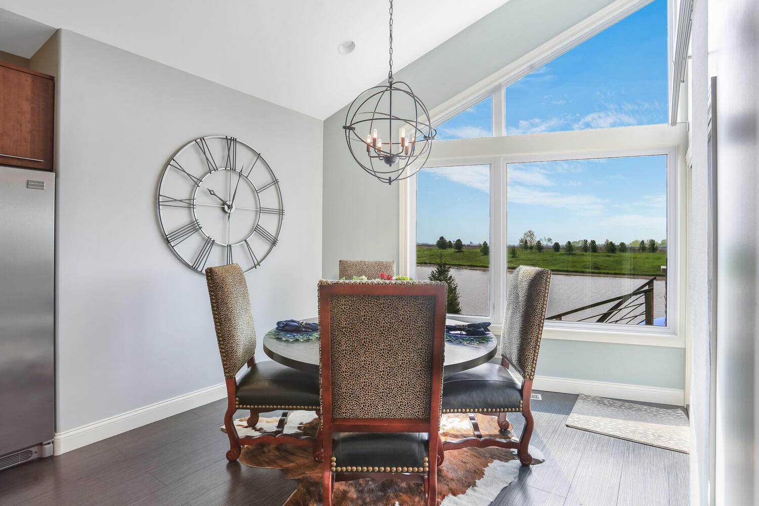 1411 Cross Creek Road Mahomet, IL 61853 - Photo 25 of 70 a view of a dining room with furniture window and wooden floor