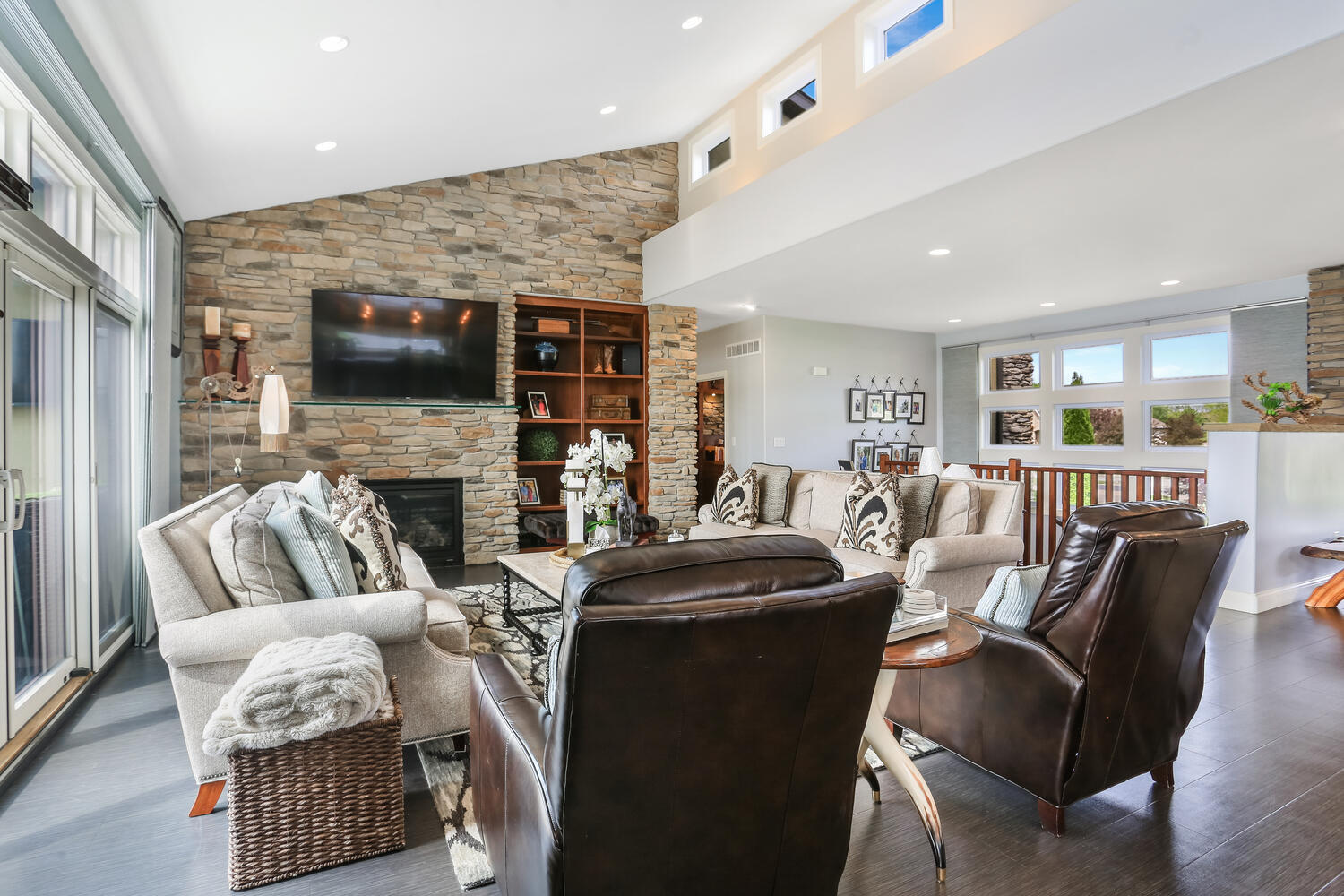 1411 Cross Creek Road Mahomet, IL 61853 - Photo 27 of 70 a living room with fireplace furniture and a flat screen tv