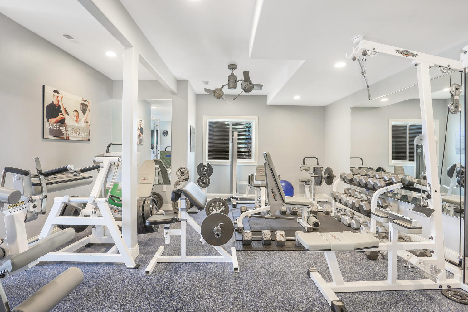 1411 Cross Creek Road Mahomet, IL 61853 - Photo 62 of 70 a view of a room with gym equipment