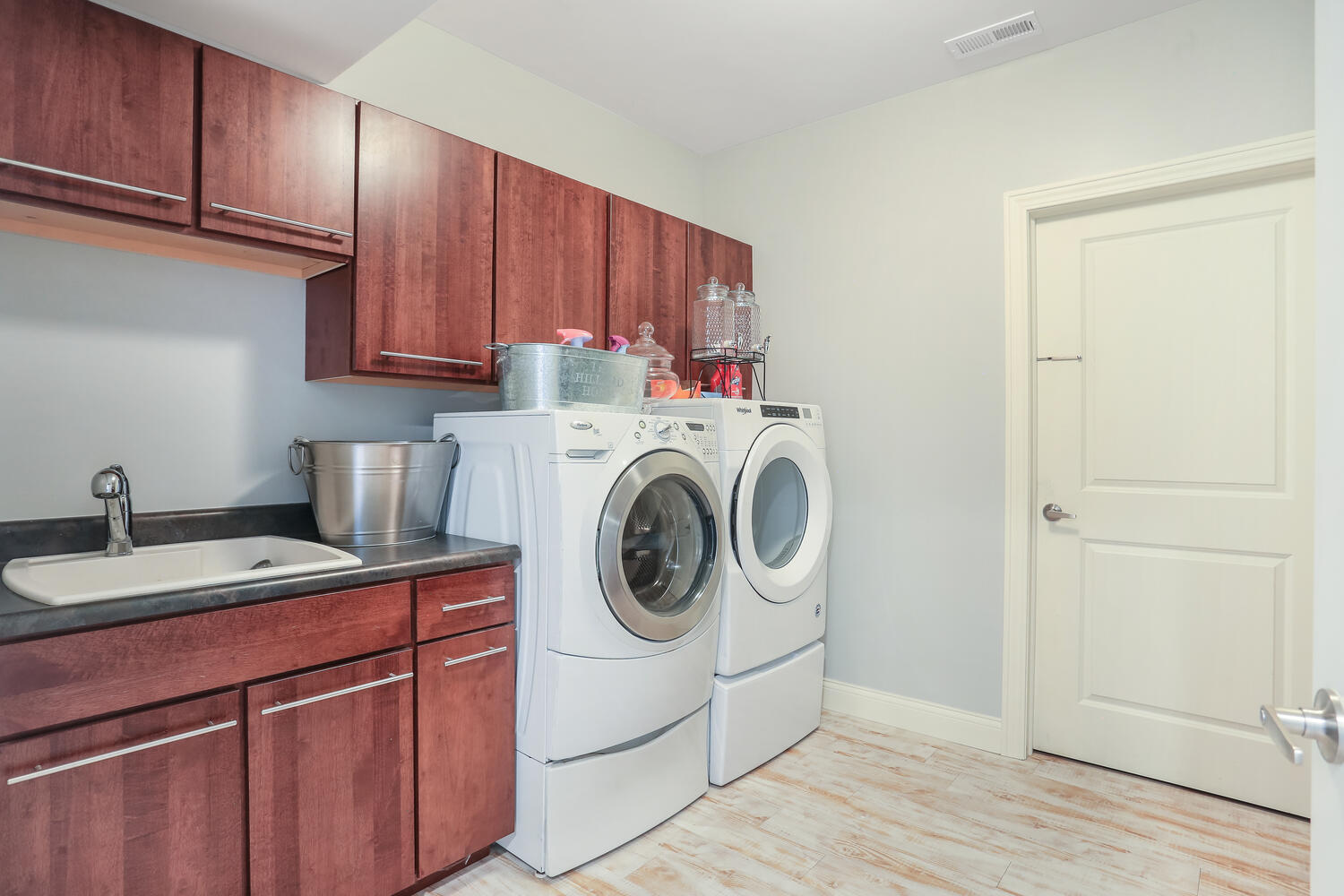 1411 Cross Creek Road Mahomet, IL 61853 - Photo 64 of 70 a utility room with sink dryer and washer