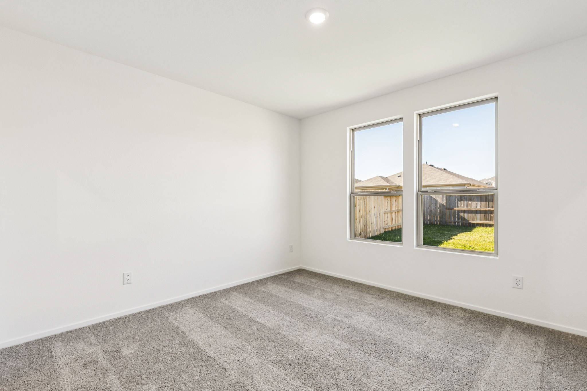 14985 Rustic Moon Road Conroe, TX 77302 - Photo 14 of 32 an empty room with a window