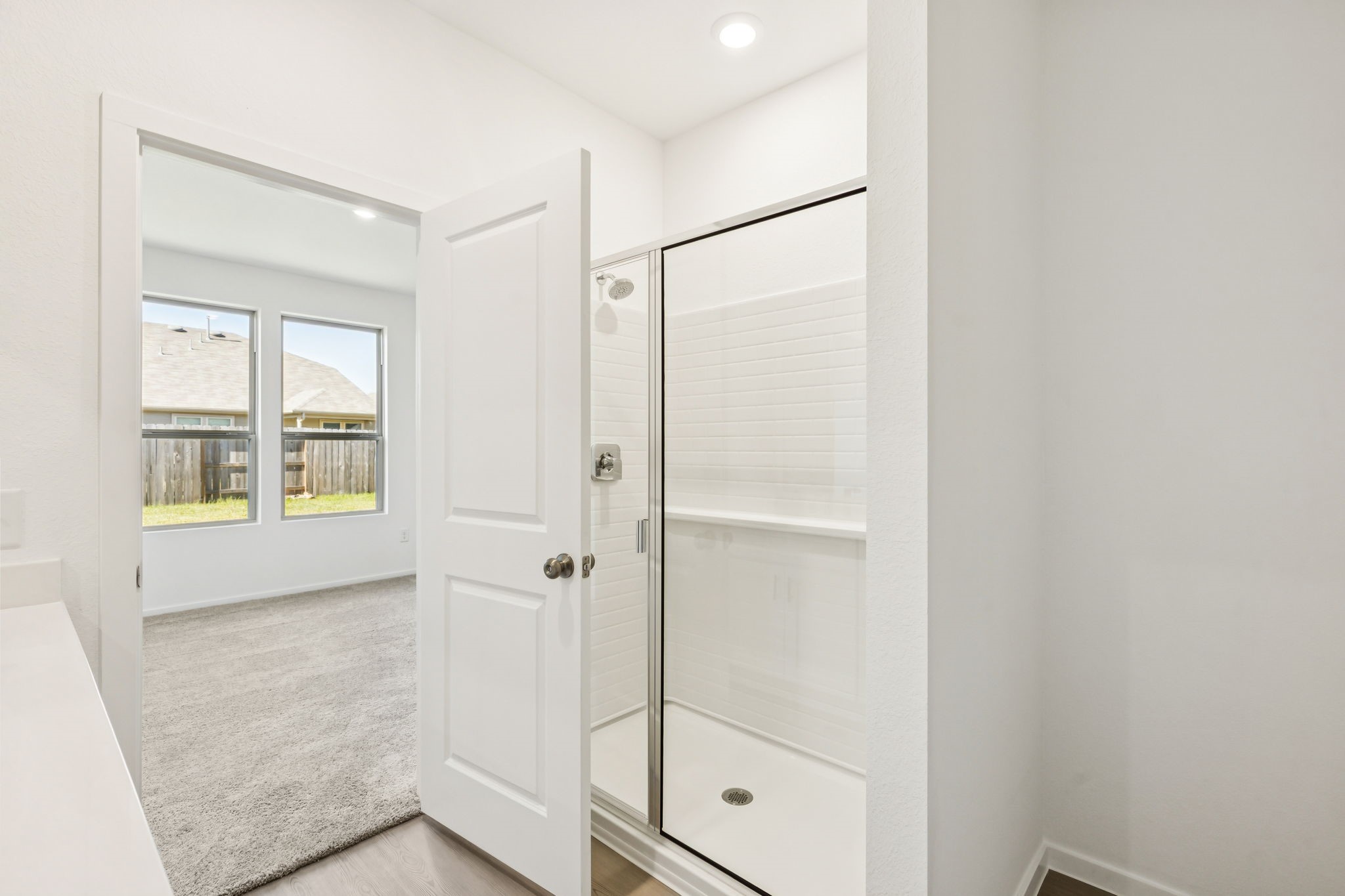 14985 Rustic Moon Road Conroe, TX 77302 - Photo 18 of 32 a bathroom with a shower