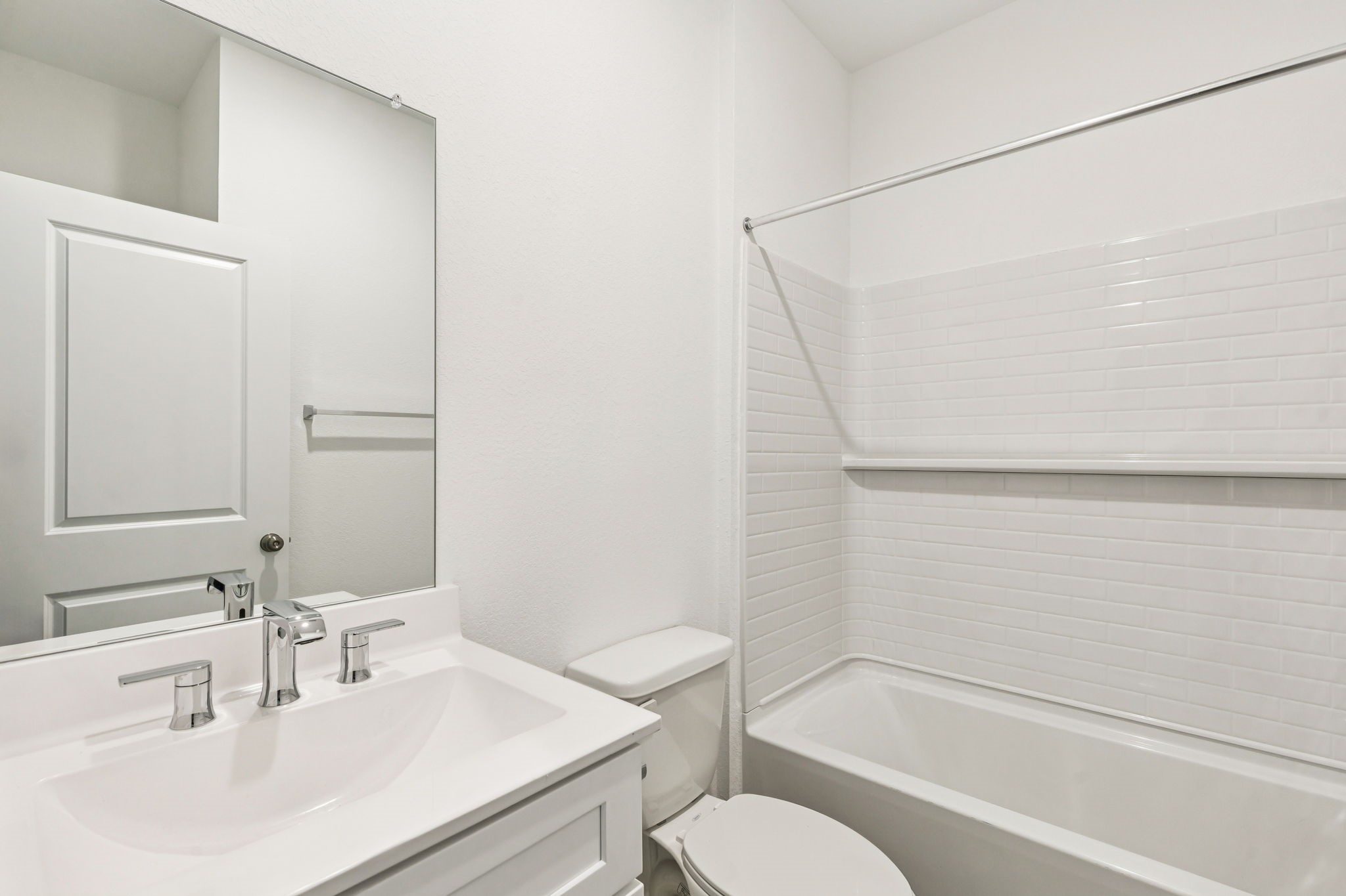 14985 Rustic Moon Road Conroe, TX 77302 - Photo 24 of 32 a bathroom with a sink toilet and shower