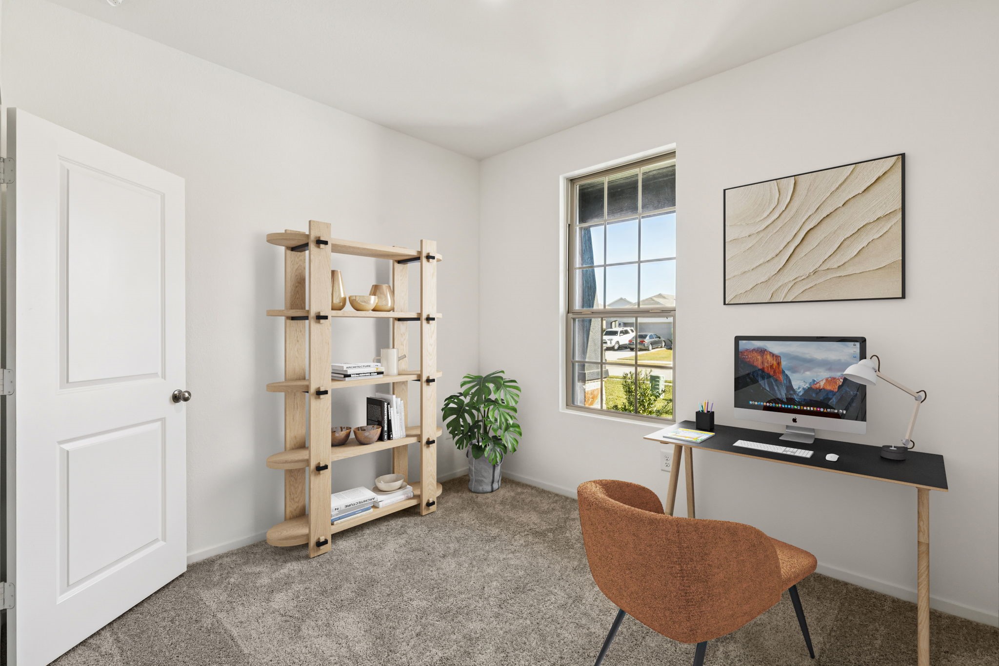 14985 Rustic Moon Road Conroe, TX 77302 - Photo 26 of 32 a living room with furniture a flat screen tv and a window