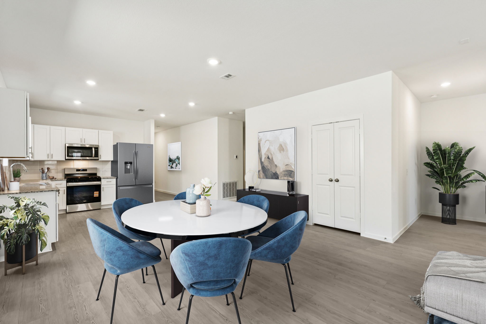 14985 Rustic Moon Road Conroe, TX 77302 - Photo 28 of 32 a view of a dining room with furniture and wooden floor