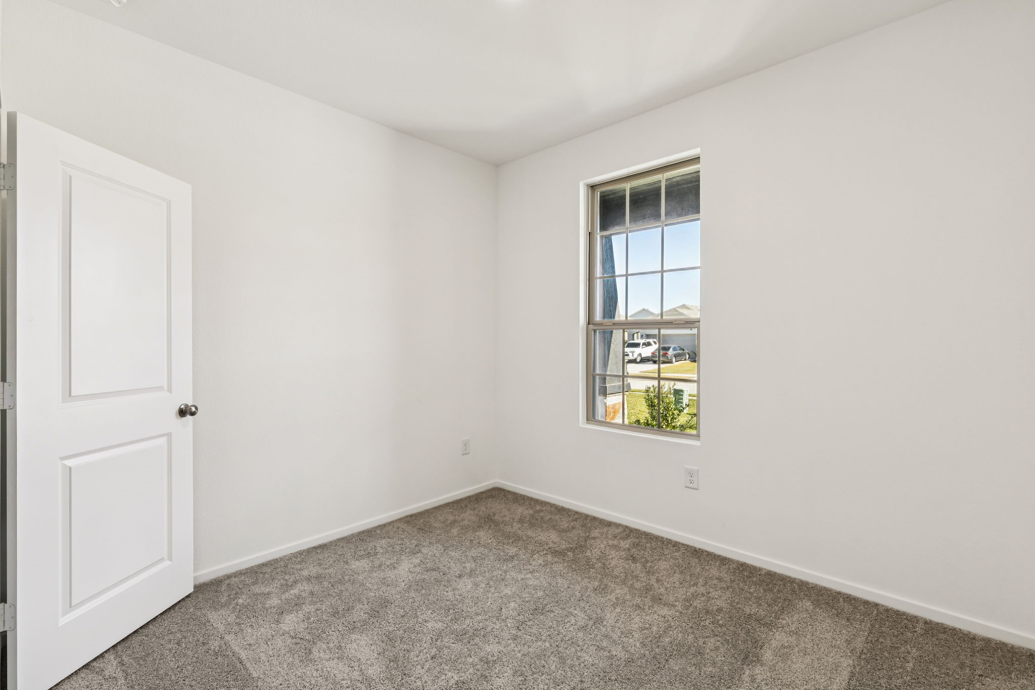 14985 Rustic Moon Road Conroe, TX 77302 - Photo 4 of 32 an empty room with windows