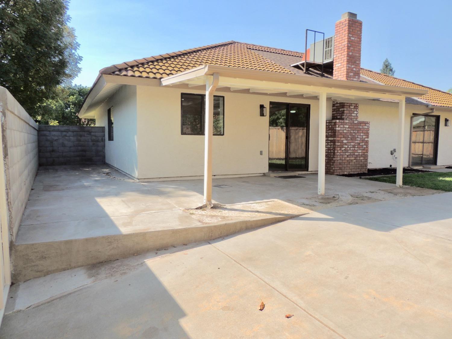 2395 Keats Avenue Clovis, CA 93611 - Photo 18 of 22 a front view of a house with a garage