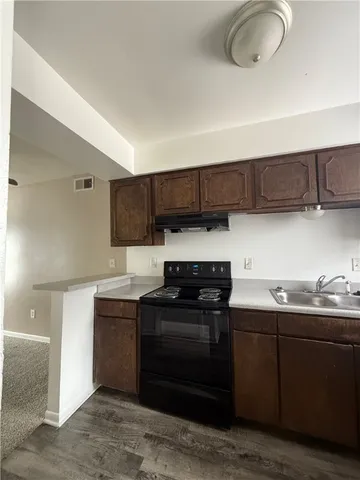 a view of empty room with windows