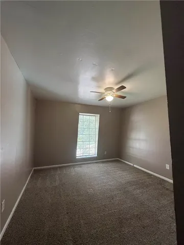 a view of a hallway with closet