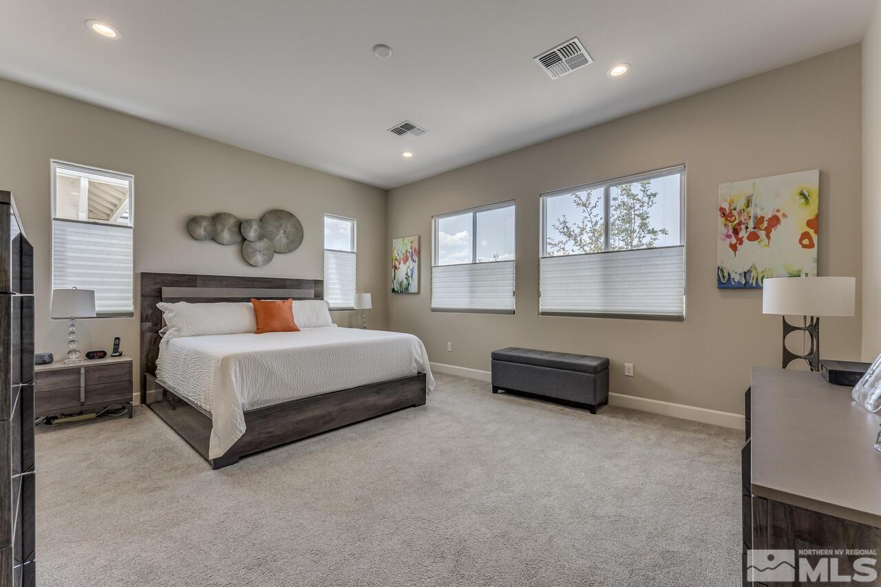 1933 Phaethon Lane Reno, NV 89521 - Photo 14 of 38 a bedroom with a bed and a cabinets
