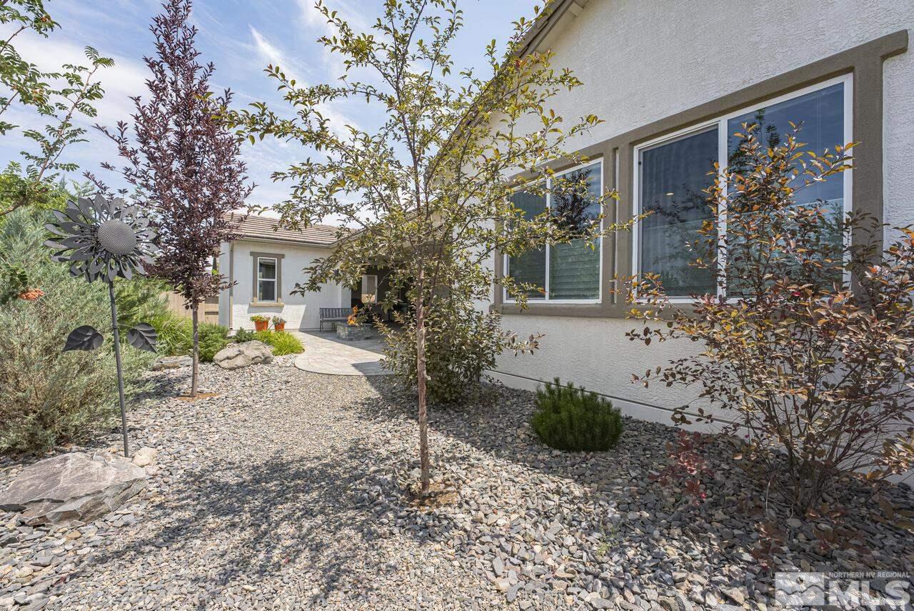 1933 Phaethon Lane Reno, NV 89521 - Photo 32 of 38 a view of a house with backyard and sitting area