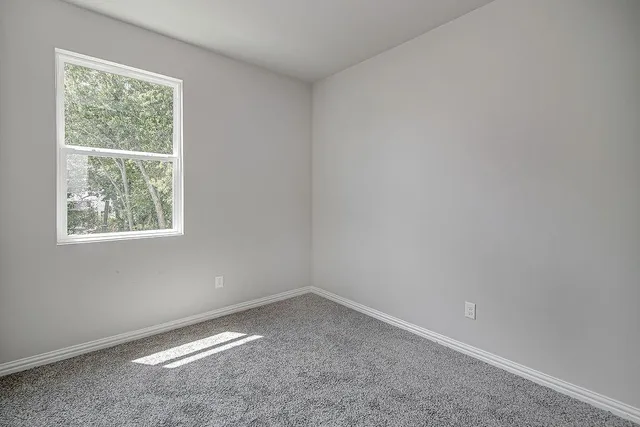 an empty room with a window