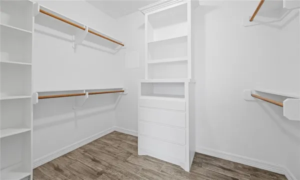a view of an empty walk in closet