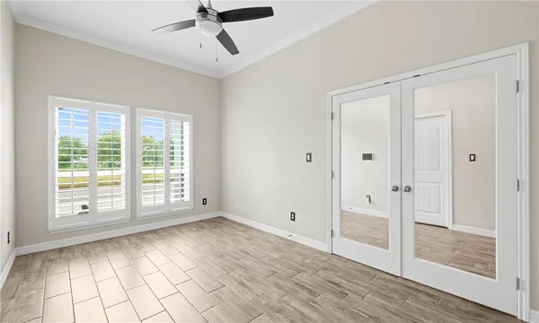 a view of an empty room with a window