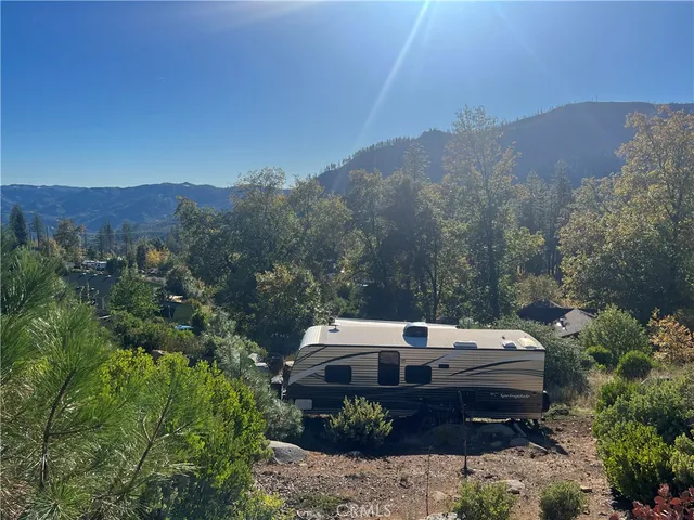 an aerial view of a house with a garden