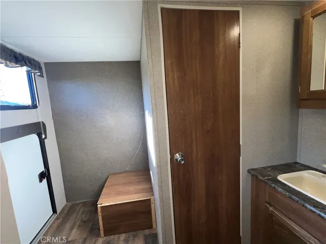 a view of a lake with a house in a background