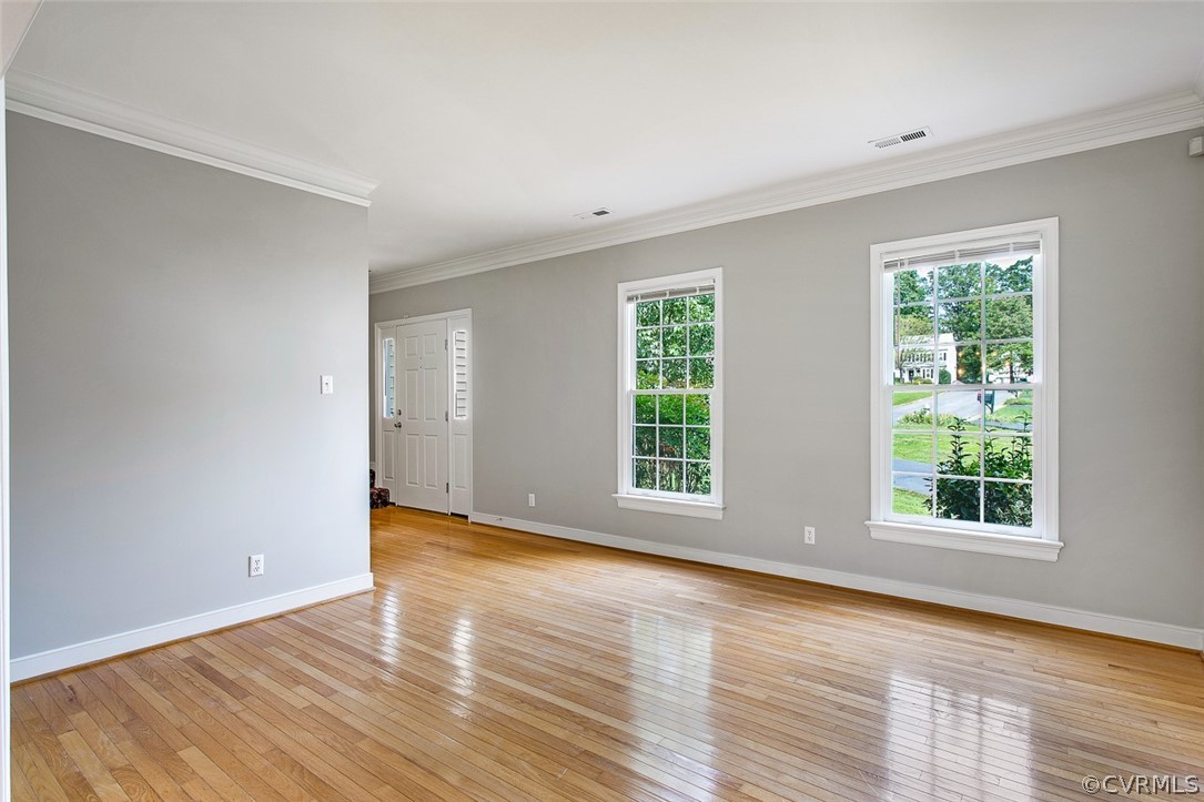 13902 Sagebrook Road Midlothian, VA 23112 - Photo 14 of 37 an empty room with wooden floor and windows