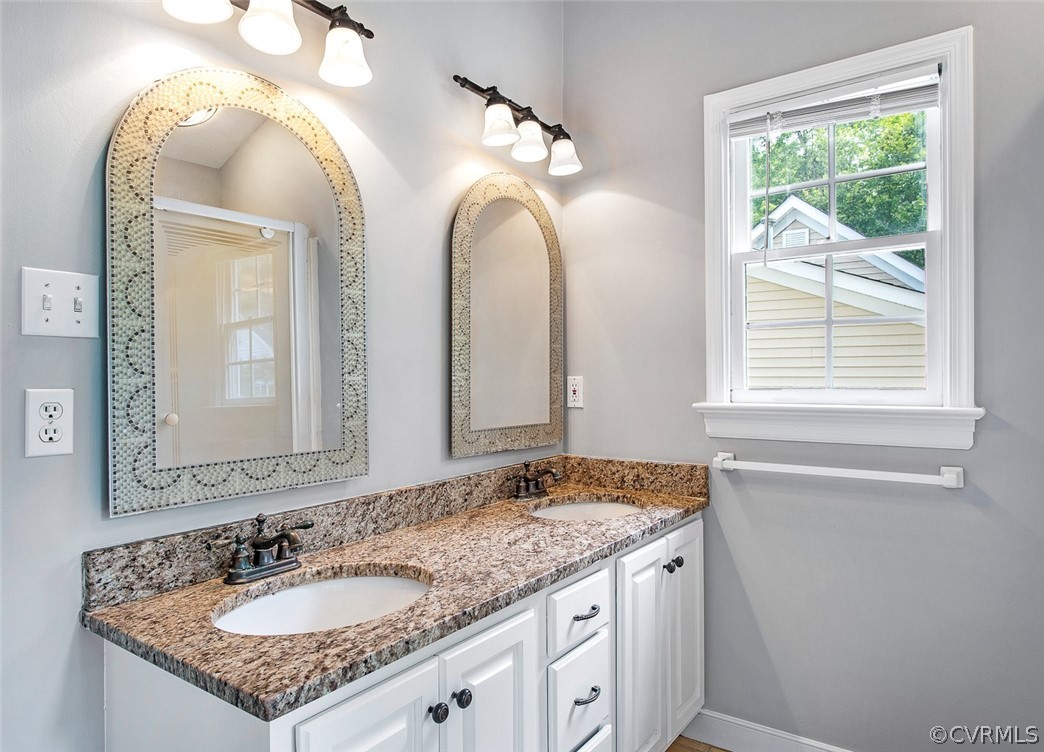 13902 Sagebrook Road Midlothian, VA 23112 - Photo 19 of 37 a bathroom with a granite countertop sink a mirror and a