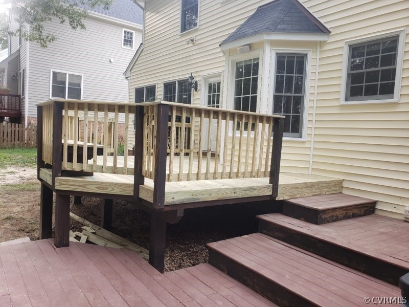 13902 Sagebrook Road Midlothian, VA 23112 - Photo 35 of 37 a view of a deck with wooden floor and fence